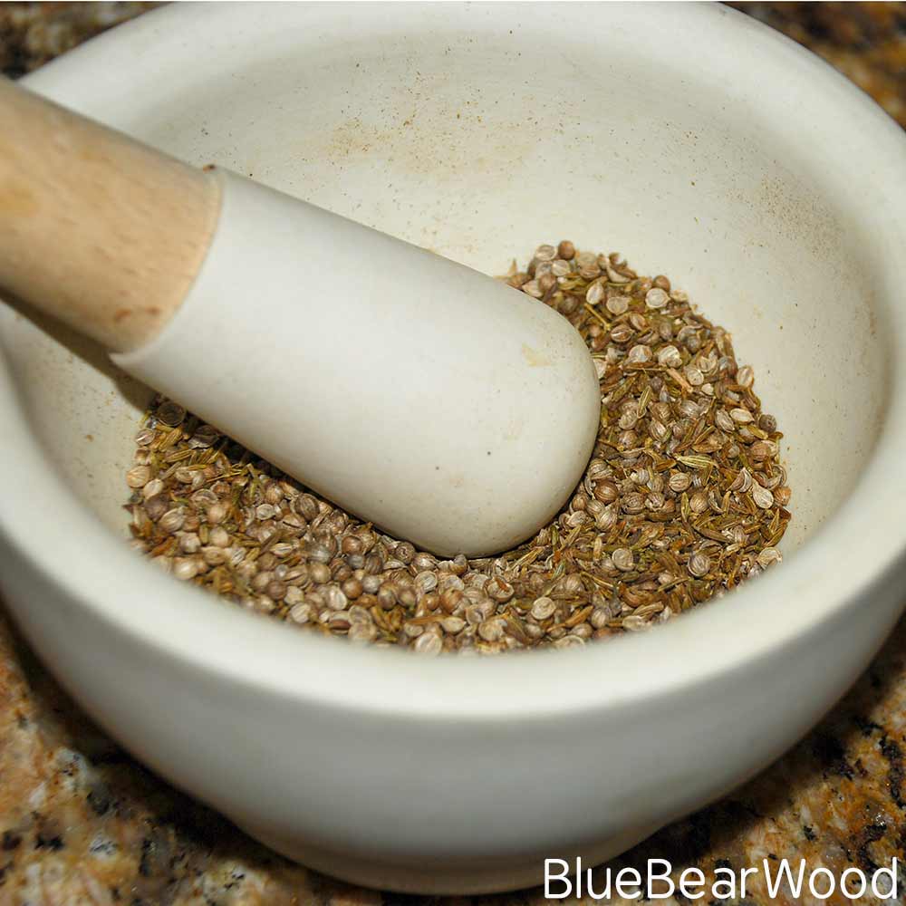 Crushing Toasted Coriander And Cumin Seeds