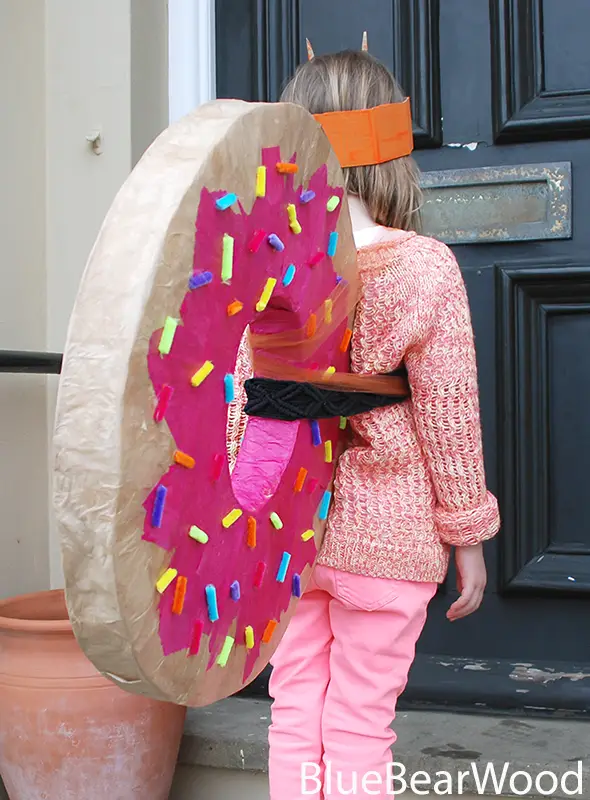 Rear view of Norman The Slug costume showing how the doughnut shell is attached