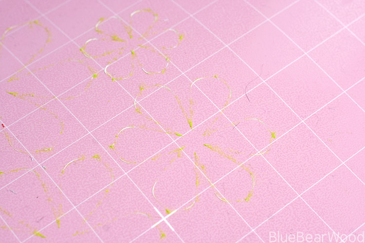 Fabric Threads On Rotary Cutter Mat