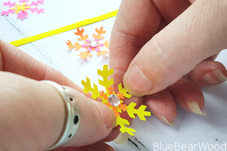 Curling The Paper Snowflake With Fingers