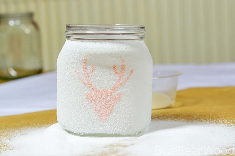Glass Jar Covered With White Sand To Give A Frosted Look