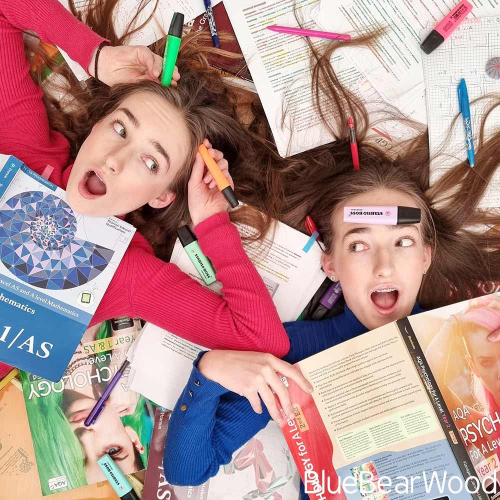 Self Care For Teens - Teenagers Surrounded By Educational Books And Papers